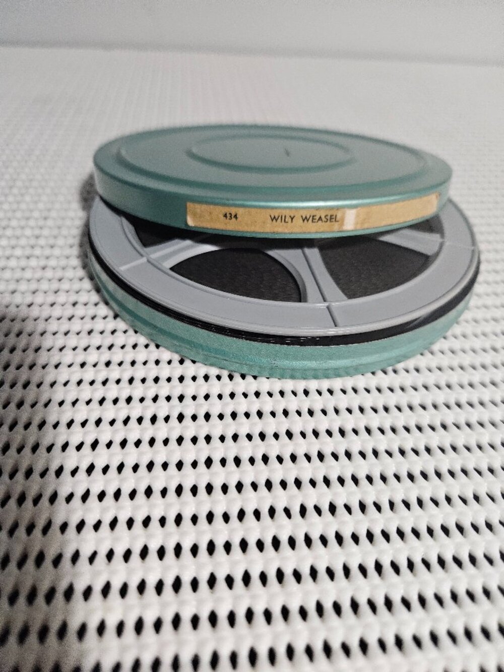 Vintage film reels 6 different movies all in their original cases